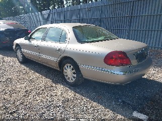2002 Lincoln Continental, VIN 1LNHM97V22Y659680. Фото 3 из 6 с аукциона IAAI. Каталог авто из США OpenDataCar.