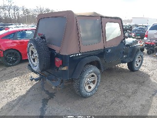 1995 Jeep Wrangler, VIN 1J4FY19P8SP225862. Фото 4 з 6 з аукціону IAAI. Каталог авто зі США OpenDataCar.