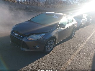 2012 Ford Focus, VIN 1FAHP3H23CL294864. Фото 2 з 6 з аукціону IAAI. Каталог авто зі США OpenDataCar.