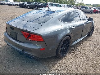 2015 Audi RS7, VIN WUAW2AFC7FN900260. Фото 4 из 6 с аукциона IAAI. Каталог авто из США OpenDataCar.