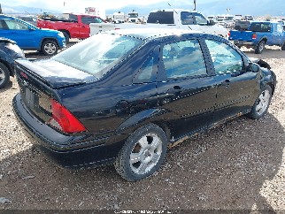 2003 Ford Focus, VIN 1FAHP38303W190260. Фото 4 из 6 с аукциона IAAI. Каталог авто из США OpenDataCar.