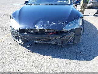 2014 Tesla Model S, VIN 5YJSA1H10EFP44912. Фото 6 из 6 с аукциона IAAI. Каталог авто из США OpenDataCar.