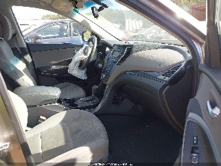 2014 Hyundai Santa Fe, VIN 5XYZT3LB2EG219945. Zdjęcie 5 z 6 z aukcji IAAI. Katalog aut z USA OpenDataCar.