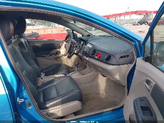 2010 Honda Insight, VIN JHMZE2H51AS011551. Фото 5 из 6 с аукциона IAAI. Каталог авто из США OpenDataCar.