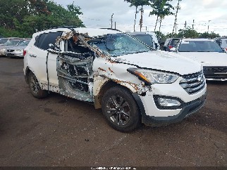 2015 Hyundai Santa Fe, VIN 5XYZU3LB9FG250589. Фото 1 из 6 с аукциона IAAI. Каталог авто из США OpenDataCar.