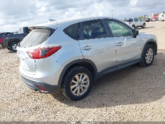 2016 Mazda CX-5, VIN JM3KE4CY9G0659795. Фото 4 з 6 з аукціону IAAI. Каталог авто зі США OpenDataCar.