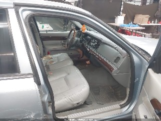 2004 Mercury Grand Marquis, VIN 2MEFM75W14X616817. Фото 5 з 6 з аукціону IAAI. Каталог авто зі США OpenDataCar.