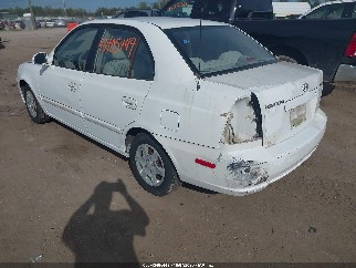 2004 Hyundai Accent, VIN KMHCG45C04U553583. Zdjęcie 3 z 6 z aukcji IAAI. Katalog aut z USA OpenDataCar.