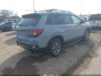 2022 Honda Passport, VIN 5FNYF8H67NB009862. Zdjęcie 4 z 6 z aukcji IAAI. Katalog aut z USA OpenDataCar.