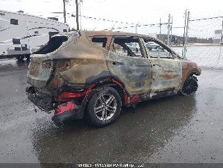 2017 Hyundai Santa Fe, VIN 5XYZUDLB7HG477370. Zdjęcie 4 z 6 z aukcji IAAI. Katalog aut z USA OpenDataCar.