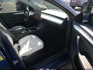 2023 Tesla Model Y, VIN 7SAYGDEE6PA173303. Фото 5 з 6 з аукціону IAAI. Каталог авто зі США OpenDataCar.