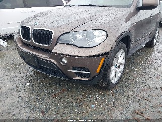 2013 Bmw X5, VIN 5UXZV4C51D0B18735. Photo 6 of 6 from IAAI auction. OpenDataCar US salvage catalog.