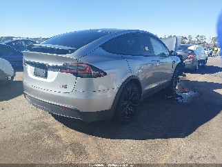 2024 Tesla Model X, VIN 7SAXCBE69RF453873. Фото 4 из 6 с аукциона IAAI. Каталог авто из США OpenDataCar.