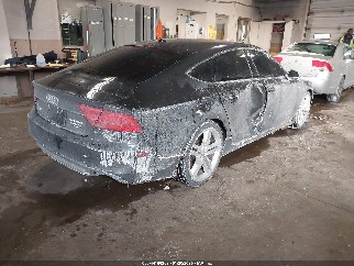 2015 Audi S7, VIN WAUW2AFC9FN022079. Фото 4 из 6 с аукциона IAAI. Каталог авто из США OpenDataCar.