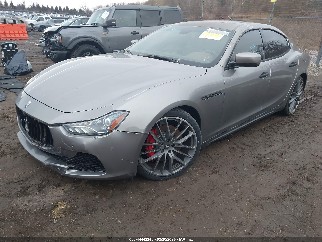 2014 Maserati Ghibli, VIN ZAM57RTA8E1126646. Фото 2 из 6 с аукциона IAAI. Каталог авто из США OpenDataCar.