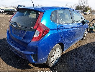 2015 Honda Fit, VIN 3HGGK5H57FM739279. Фото 4 з 6 з аукціону IAAI. Каталог авто зі США OpenDataCar.