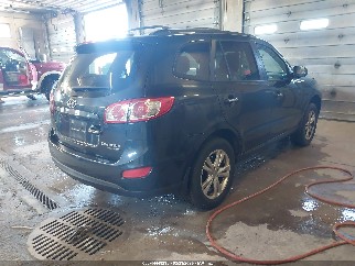 2011 Hyundai Santa Fe, VIN 5XYZKDAG8BG089575. Zdjęcie 4 z 6 z aukcji IAAI. Katalog aut z USA OpenDataCar.