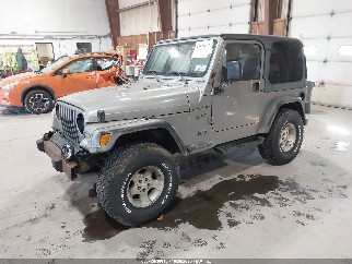 2002 Jeep Wrangler, VIN 1J4FA49S42P707478. Фото 2 з 6 з аукціону IAAI. Каталог авто зі США OpenDataCar.