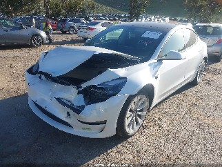 2023 Tesla Model 3, VIN 5YJ3E1EA1PF512531. Фото 2 з 6 з аукціону IAAI. Каталог авто зі США OpenDataCar.