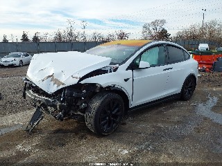 2023 Tesla Model X, VIN 7SAXCAE59PF384360. Фото 2 из 6 с аукциона IAAI. Каталог авто из США OpenDataCar.