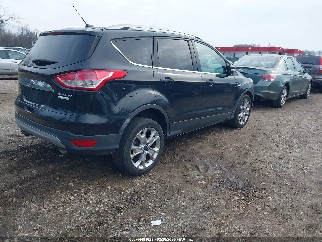 2014 Ford Escape, VIN 1FMCU0JX6EUB56147. Zdjęcie 4 z 6 z aukcji IAAI. Katalog aut z USA OpenDataCar.