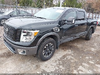 2017 Nissan Titan, VIN 1N6AA1E55HN569627. Фото 2 из 6 с аукциона IAAI. Каталог авто из США OpenDataCar.