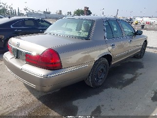 2004 Mercury Grand Marquis, VIN 2MEFM74W94X623578. Фото 4 з 6 з аукціону IAAI. Каталог авто зі США OpenDataCar.