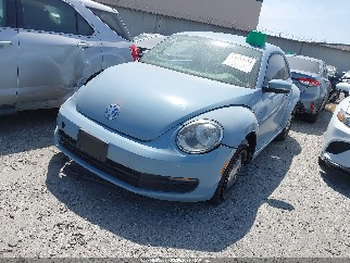 2014 Volkswagen Beetle, VIN 3VWJ17AT5EM634960. Фото 2 з 6 з аукціону IAAI. Каталог авто зі США OpenDataCar.