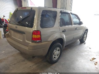 2001 Ford Escape, VIN 1FMYU01181KA25261. Zdjęcie 4 z 6 z aukcji IAAI. Katalog aut z USA OpenDataCar.