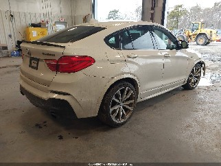 2016 Bmw X4, VIN 5UXXW7C57G0M91124. Фото 4 из 6 с аукциона IAAI. Каталог авто из США OpenDataCar.