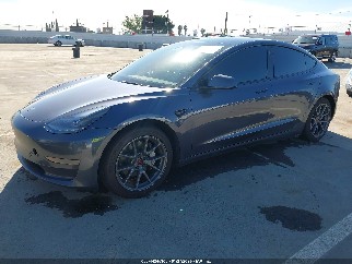 2023 Tesla Model 3, VIN 5YJ3E1EA2PF605347. Фото 2 з 6 з аукціону IAAI. Каталог авто зі США OpenDataCar.