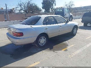 1995 Toyota Camry, VIN 4T1GK13E9SU090259. Фото 4 з 6 з аукціону IAAI. Каталог авто зі США OpenDataCar.