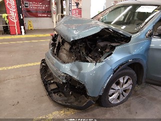 2014 Honda CR-V, VIN 2HKRM4H70EH670985. Zdjęcie 6 z 6 z aukcji IAAI. Katalog aut z USA OpenDataCar.