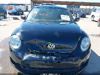 2014 Volkswagen Beetle, VIN 3VWF17AT1EM652104. Photo 6 of 6 from IAAI auction. OpenDataCar US salvage catalog.