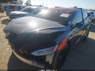 2022 Tesla Model X, VIN 7SAXCBE63NF359143. Фото 2 з 6 з аукціону IAAI. Каталог авто зі США OpenDataCar.