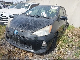 2014 Toyota Prius C, VIN JTDKDTB33E1559565. Фото 2 з 6 з аукціону IAAI. Каталог авто зі США OpenDataCar.