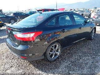 2014 Ford Focus, VIN 1FADP3F21EL219701. Фото 4 з 6 з аукціону IAAI. Каталог авто зі США OpenDataCar.