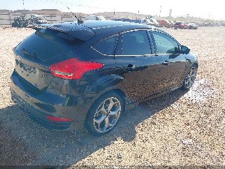 2015 Ford Focus, VIN 1FADP3L90FL334146. Photo 4 of 6 from IAAI auction. OpenDataCar US salvage catalog.