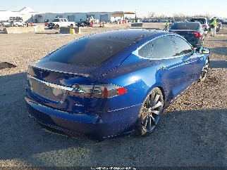 2016 Tesla Model S, VIN 5YJSA1E40GF126555. Фото 4 из 6 с аукциона IAAI. Каталог авто из США OpenDataCar.