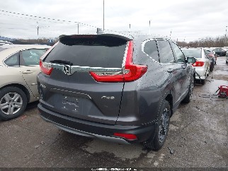 2018 Honda CR-V, VIN 7FARW2H55JE002576. Фото 4 з 6 з аукціону IAAI. Каталог авто зі США OpenDataCar.
