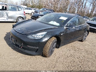 2019 Tesla Model 3, VIN 5YJ3E1EB0KF208673. Фото 2 из 6 с аукциона IAAI. Каталог авто из США OpenDataCar.