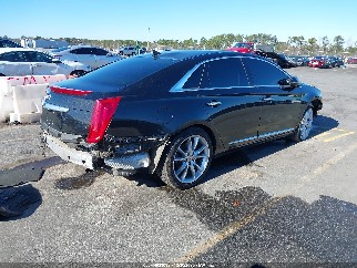 2013 Cadillac XTS, VIN 2G61S5S35D9209350. Zdjęcie 4 z 6 z aukcji IAAI. Katalog aut z USA OpenDataCar.
