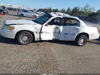 2000 Lincoln Town Car, VIN 1LNHM82W6YY899902. Фото 6 з 6 з аукціону IAAI. Каталог авто зі США OpenDataCar.