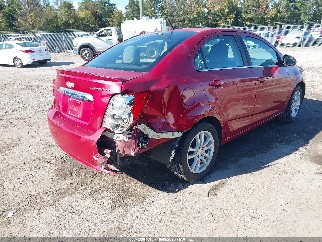 2013 Chevrolet Sonic, VIN 1G1JC5SH9D4183417. Zdjęcie 4 z 6 z aukcji IAAI. Katalog aut z USA OpenDataCar.