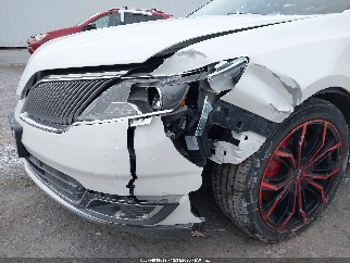 2014 Lincoln MKS, VIN 1LNHL9FT0EG610605. Photo 6 of 6 from IAAI auction. OpenDataCar US salvage catalog.