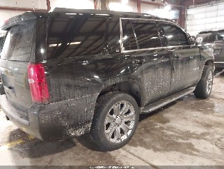 2017 Chevrolet Tahoe, VIN 1GNSKBKC5HR240052. Photo 4 of 6 from IAAI auction. OpenDataCar US salvage catalog.