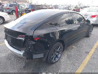 2021 Tesla Model 3, VIN 5YJ3E1EA2MF938613. Фото 4 з 6 з аукціону IAAI. Каталог авто зі США OpenDataCar.