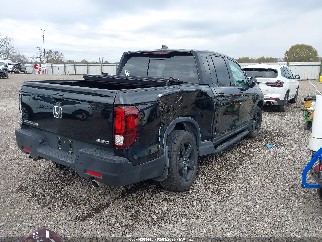 2021 Honda Ridgeline, VIN 5FPYK3F89MB016093. Фото 4 з 6 з аукціону IAAI. Каталог авто зі США OpenDataCar.