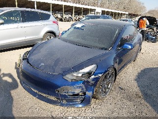 2022 Tesla Model 3, VIN 5YJ3E1EB1NF184680. Фото 2 з 6 з аукціону IAAI. Каталог авто зі США OpenDataCar.