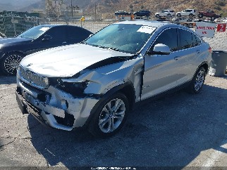 2015 Bmw X4, VIN 5UXXW3C56F0M87217. Фото 2 из 6 с аукциона IAAI. Каталог авто из США OpenDataCar.